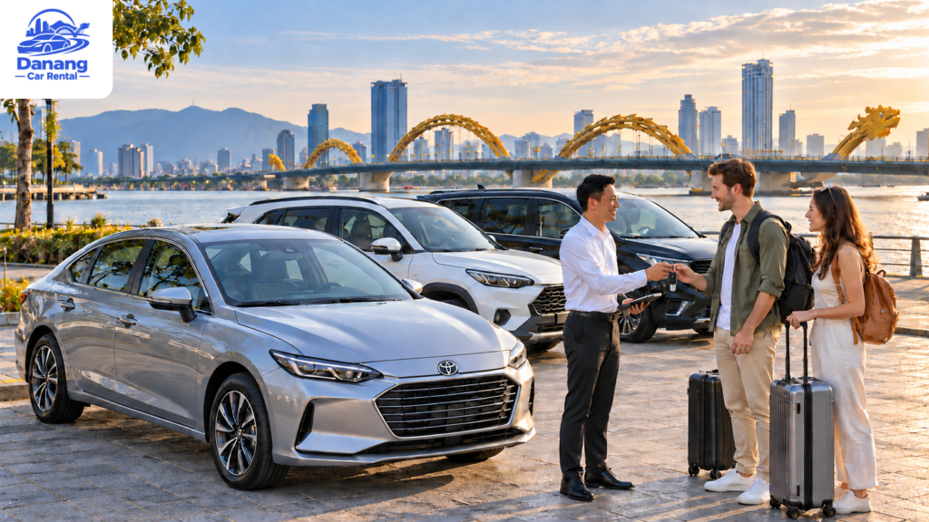 Renting a car in Vietnam: a provider hands car keys to travellers in Da Nang