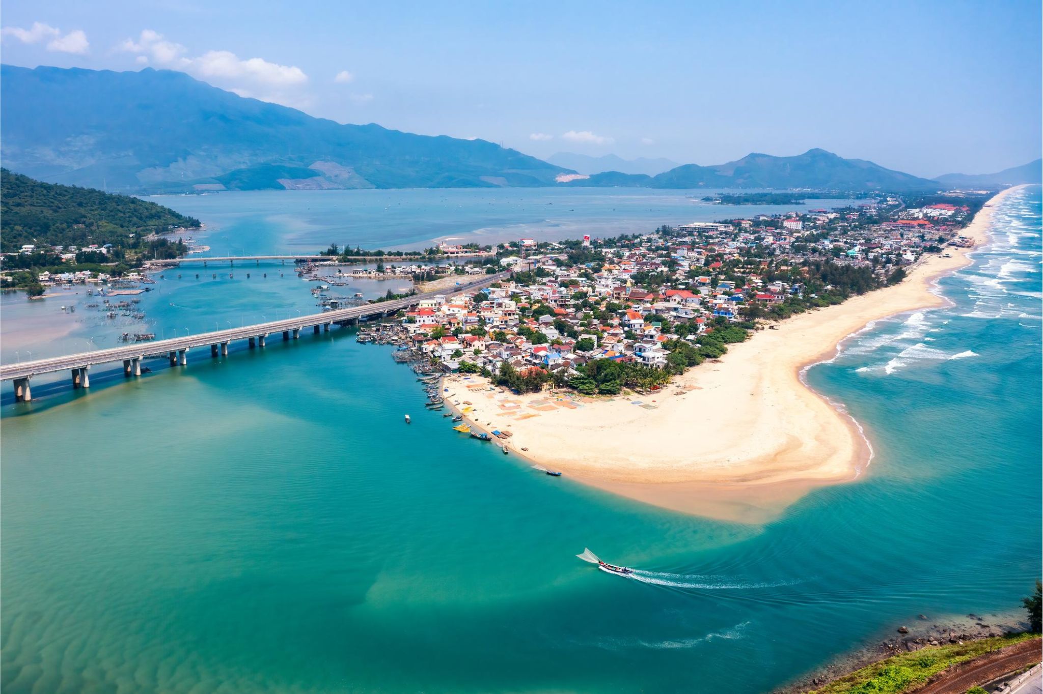 Lang Co Bay with a sandy coastline and green mountains in Central Vietnam